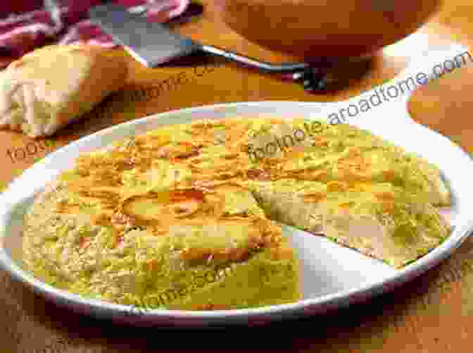 A Golden Brown Tortilla Española, Made With Eggs, Potatoes, And Onions. European Cookbook Series: Spanish Famous Recipes