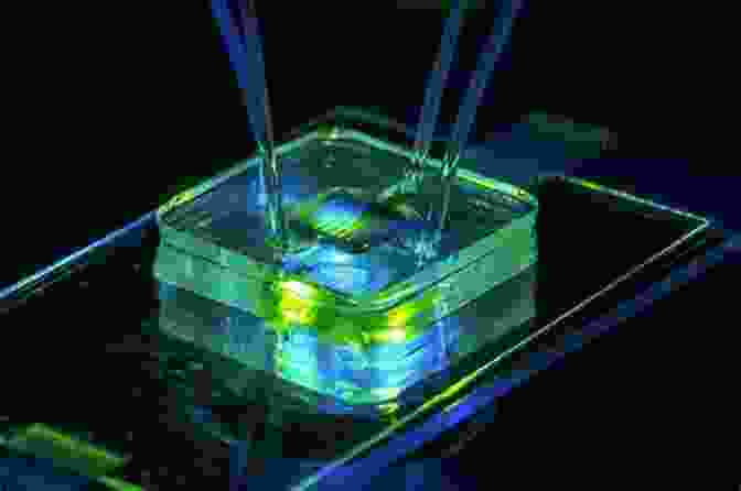 A Group Of Scientists Working On A Microfluidic Device Minimal Cells: Design Construction Biotechnological Applications