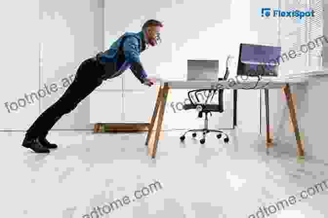 A Man Performing A Desk Push Up Exercise Workout At Work: 25 Exercises For Back Health To Do At Your Desk