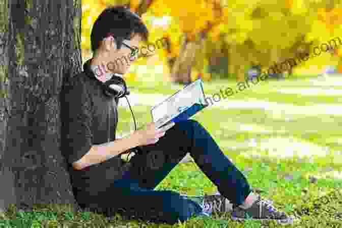 A Person Sitting Under A Tree, Reading A Book Robbery And Redemption: Cancer As Identity Theft (Death Value And Meaning Series)