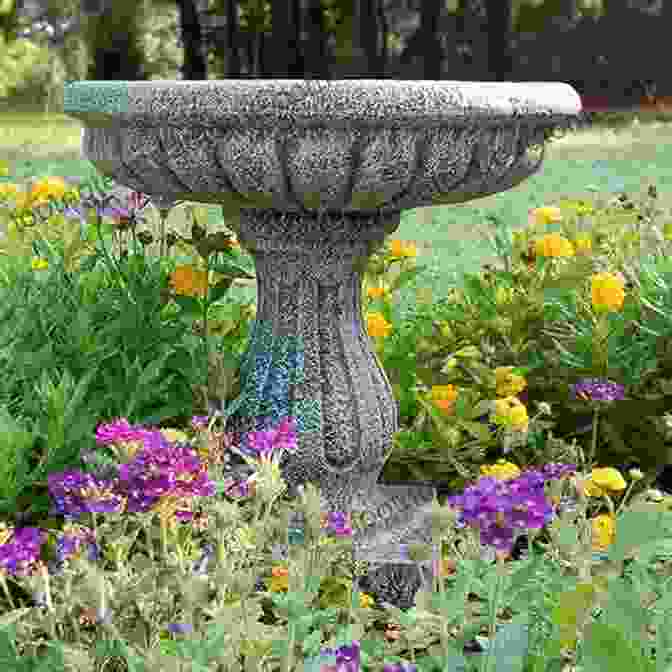 A Whimsical Garden Accent In The Form Of A Stone Bird Bath Surrounded By Colorful Flowers And Lush Greenery House And Home: Creating A Beautiful Home: 10 Hardscape Ideas For A Beautiful Yard