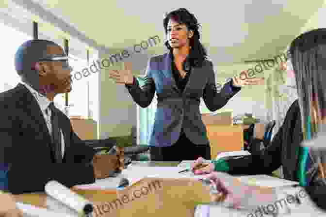 Confident Woman Speaking In A Meeting How To Talk To Your Boss About Race: Speaking Up Without Getting Shut Down