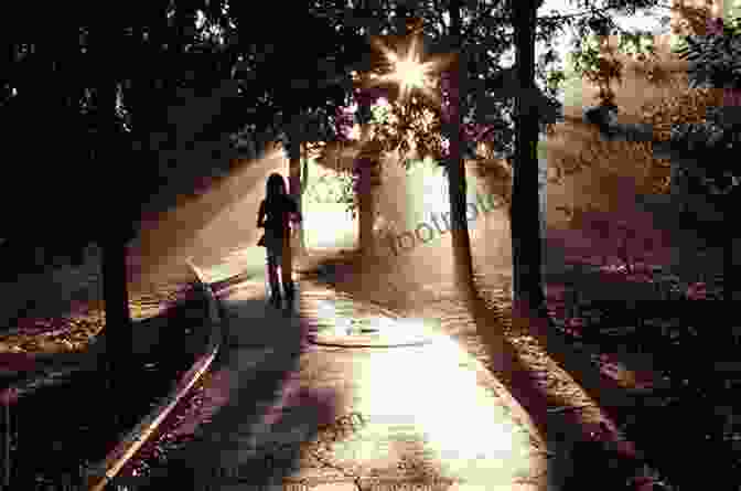 Woman Walking On A Path Towards A Radiant Light Me To We: Finding Meaning In A Material World